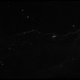 A raw image of the Carina Nebula as seen by NIRCam is mostly black to the human eye, with some white specks from some light sources. It is clear that infrared light cannot be seen by the human eye.